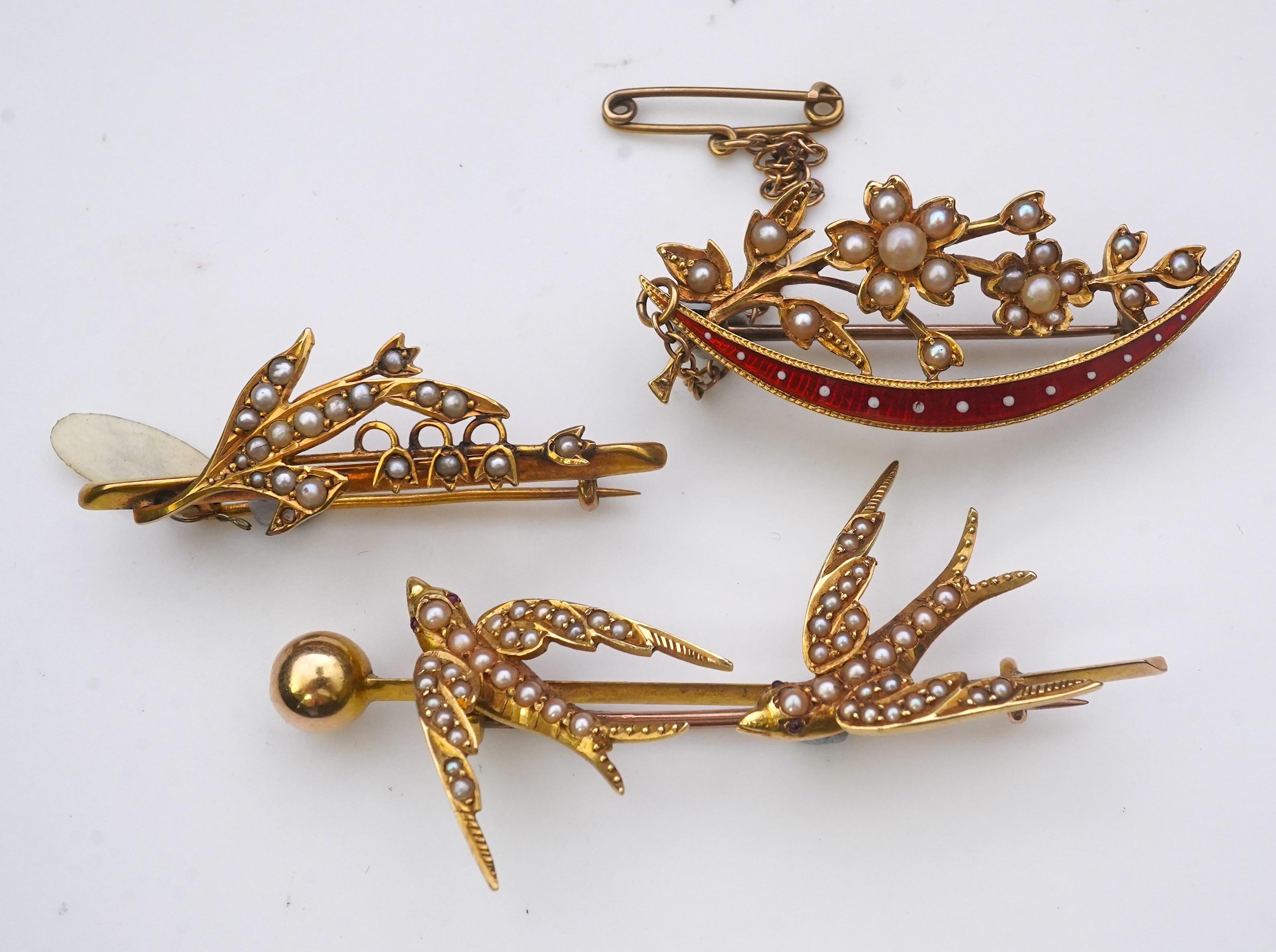 A collection of three late Victorian/Edwardian seed pearl brooches, circa 1900